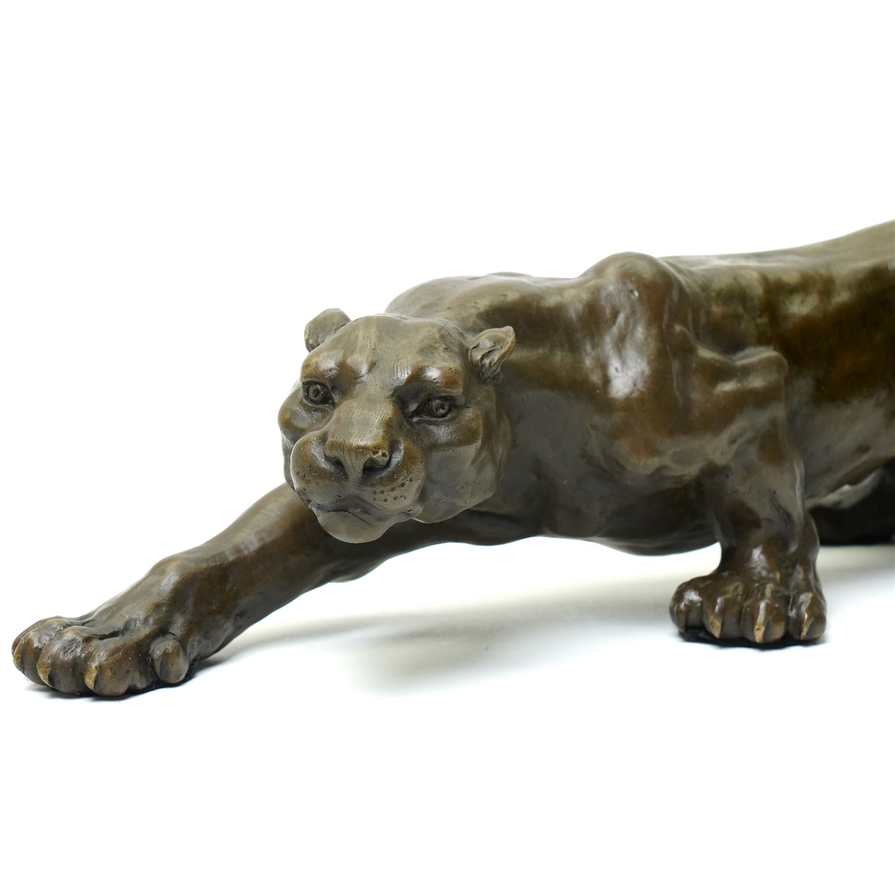Bronze figure, modelled as a cougar in crouching pose, after Milo and with foundry mark, L42cm 