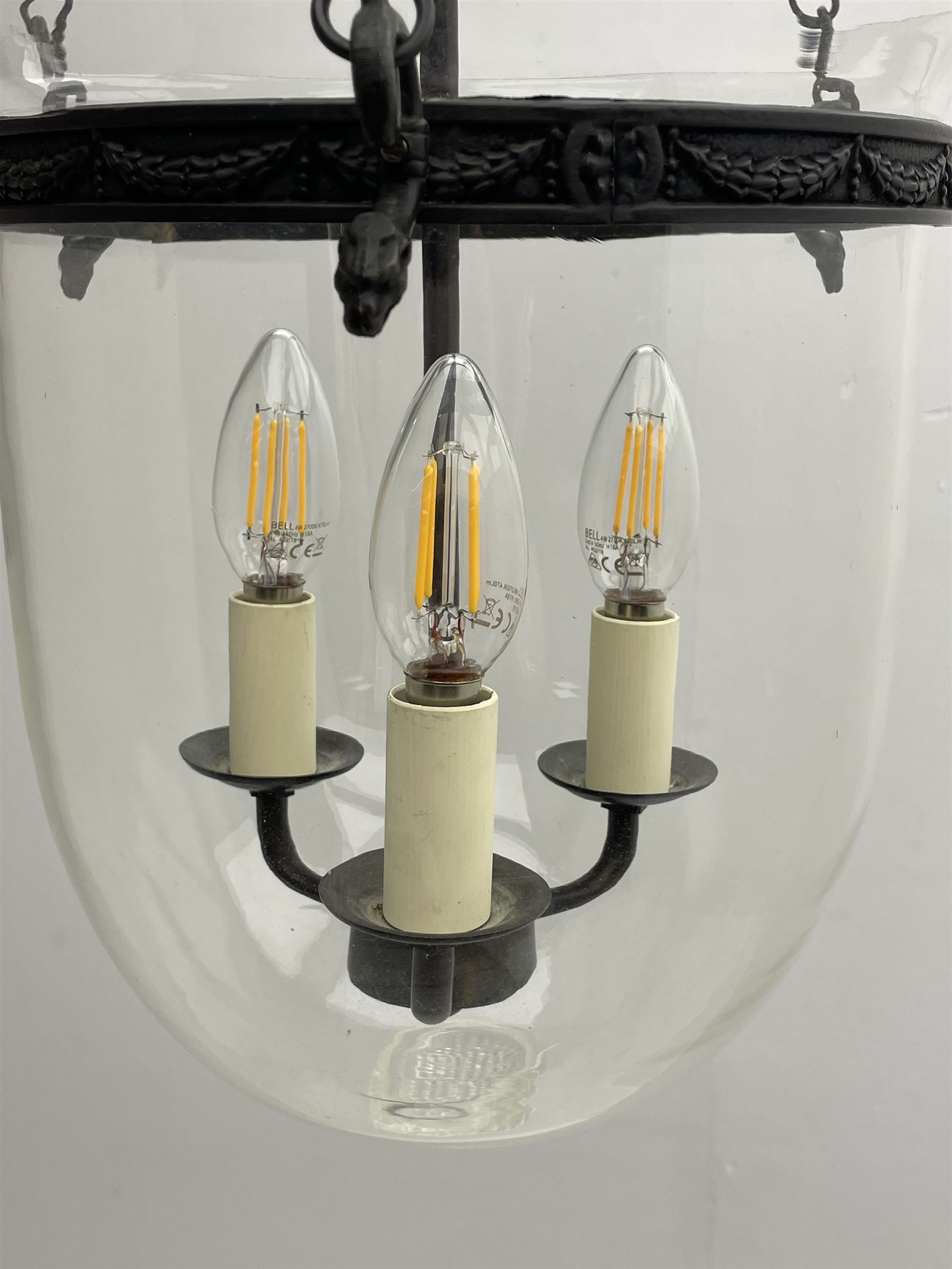 Vaughan Designs - Regency design bronzed metal and glass hall lantern, three branch light in glass bell, the band decorated with bell flower garlands and serpentine mythical beast chain brackets