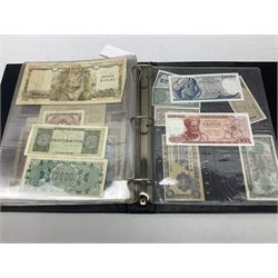 World banknotes, including Queen Elizabeth II The States of Jersey one pound 'DB202703', five pounds 'BB527762' and ten pounds 'AB651481', reserve bank of New Zealand two dollars '1L3 741894', King George V Straits Settlements one dollar 1st January 1935 'F/83 28924', various Bank of England notes etc, housed in two ring binder albums