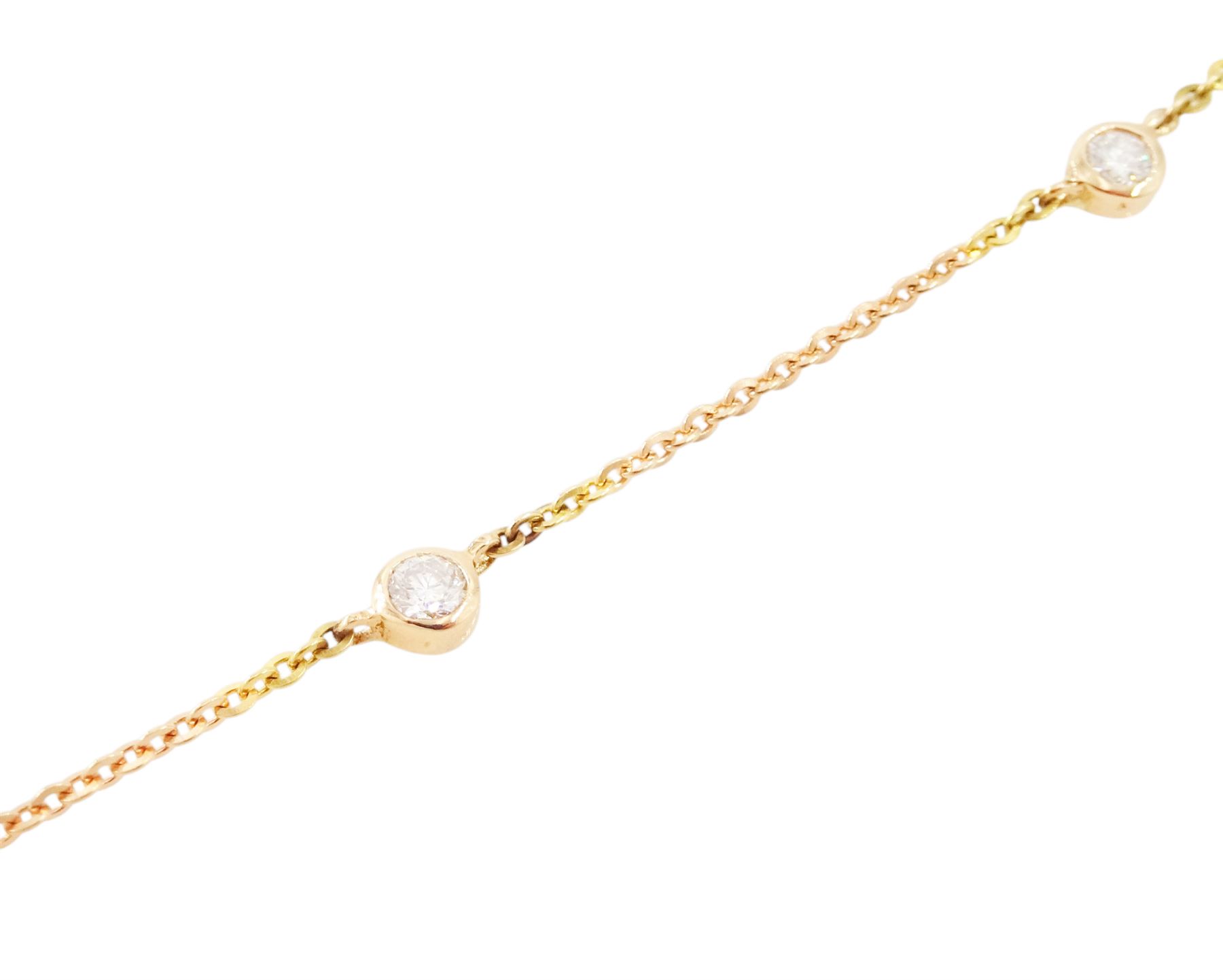 18ct rose gold pink tourmaline and diamond pendant necklace, oval cut tourmaline of 15.41 carat, surrounded by round brilliant cut diamonds, to a trace link chain necklace set with four diamonds, stamped 750, total diamond weight 1.22 carat, with World Gemological Institute report