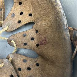 WW2 German Infantry M40 steel helmet with tropical finish and traces of single decal; with chin strap and leather liner marked 57 twice in red; back apron stamped 11 38