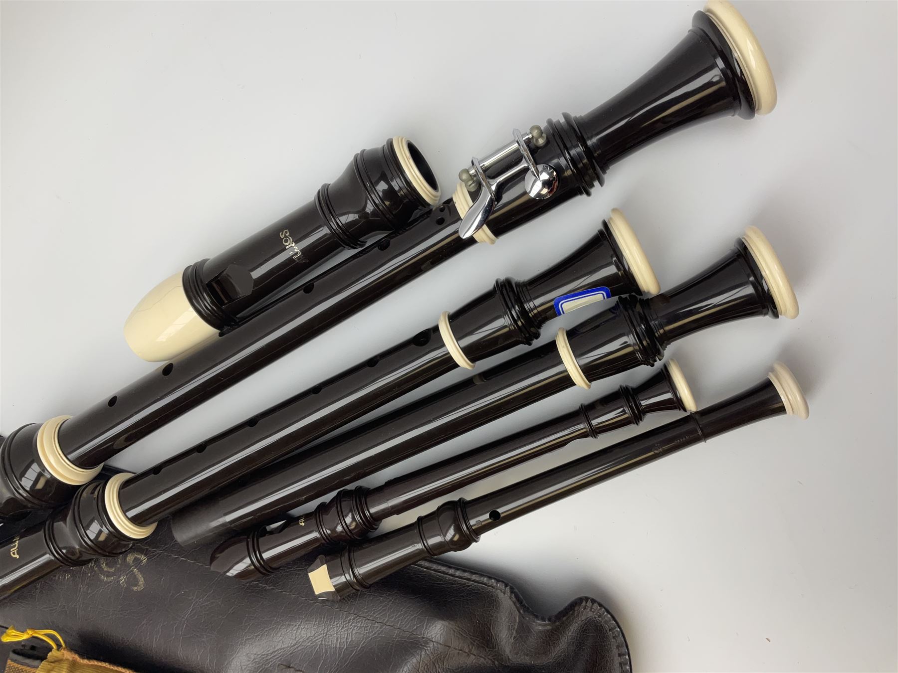 Set of four Japanese Aulos recorders including Soprano, largest 63cm