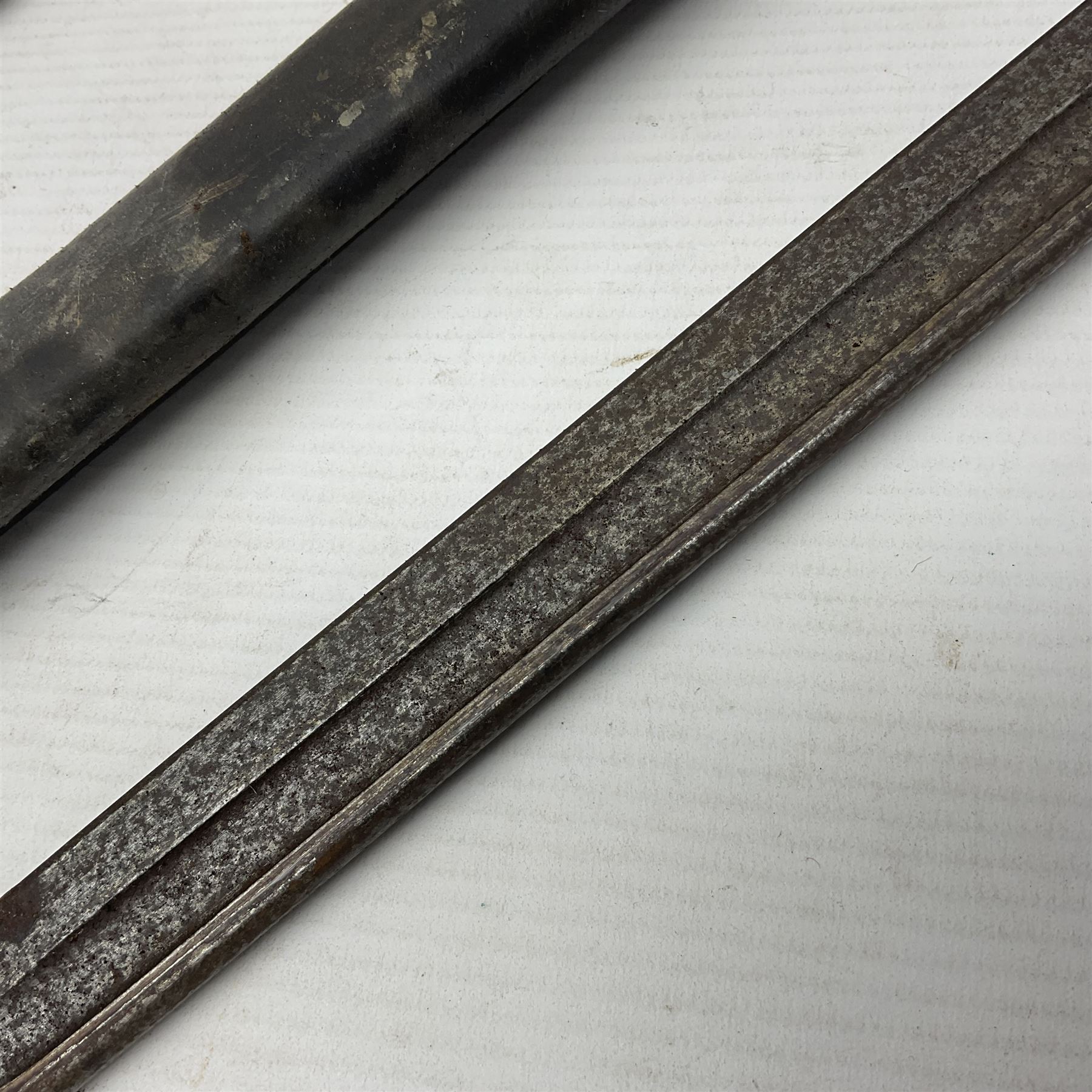 WWI Remington Pattern 1913 bayonet, the 43cm fullered blade with various marks to the ricasso including date code 11 16; in leather covered scabbard with various stamps including JWB 17 L58cm overall; and a French Model 1866 sabre bayonet (no scabbard)