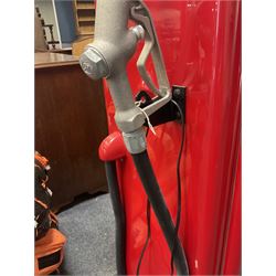 Roadside Relics Fender Custom Shop guitar display case, modelled as an American petrol pump, with a circular two-tone Fender logo light upon the pillar box red cabinet, three sides with glazed panels and chrome detailing, one etched with Fender logo, the interior with removable guitar stand, height including light 184cm