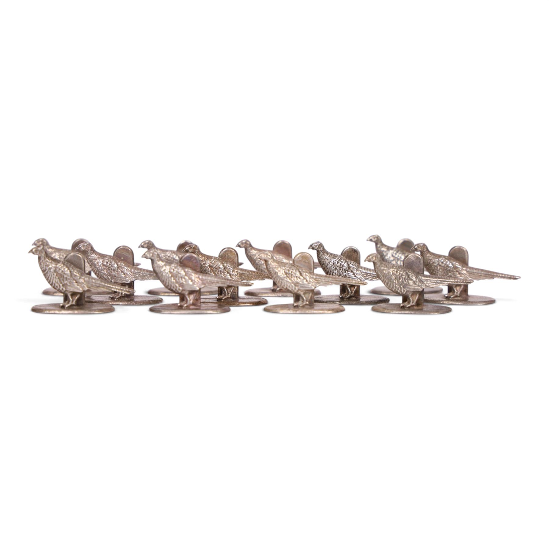 Set of twenty-four pheasant place holders, on oval base, H3cm