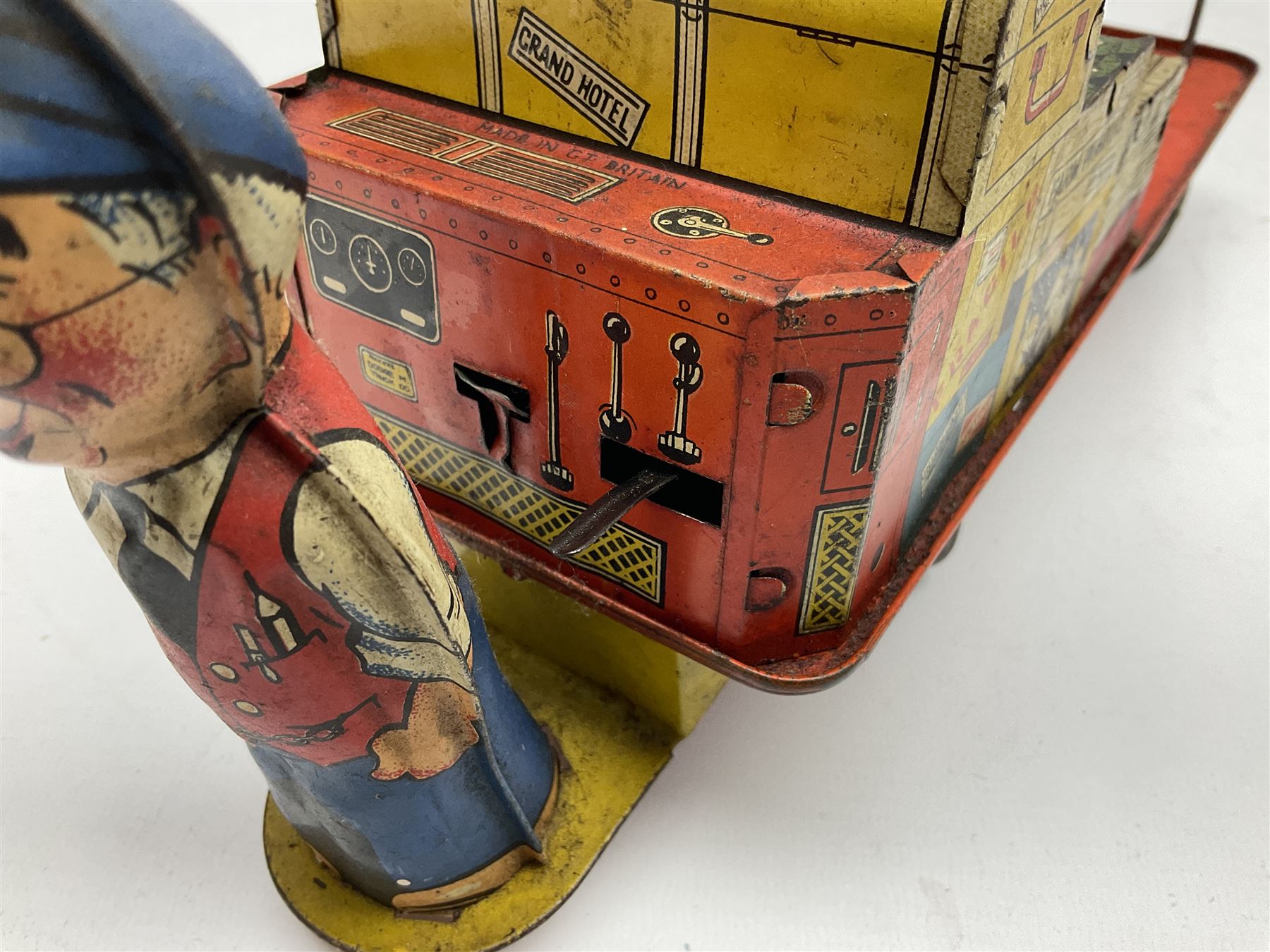 Wells Brimtoy 'Mr. Porter and his Truck' clockwork lithographed tin-plate mechanical toy L30.5cm