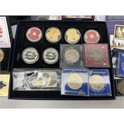 Commemorative and other coinage, including various Queen Elizabeth II 'London 2012 sports collection' fifty pence coins on cards, commemorative crowns, Millennium 2000 'Time Capsule' coin set, channel islands old round one pound coins, part sets etc
