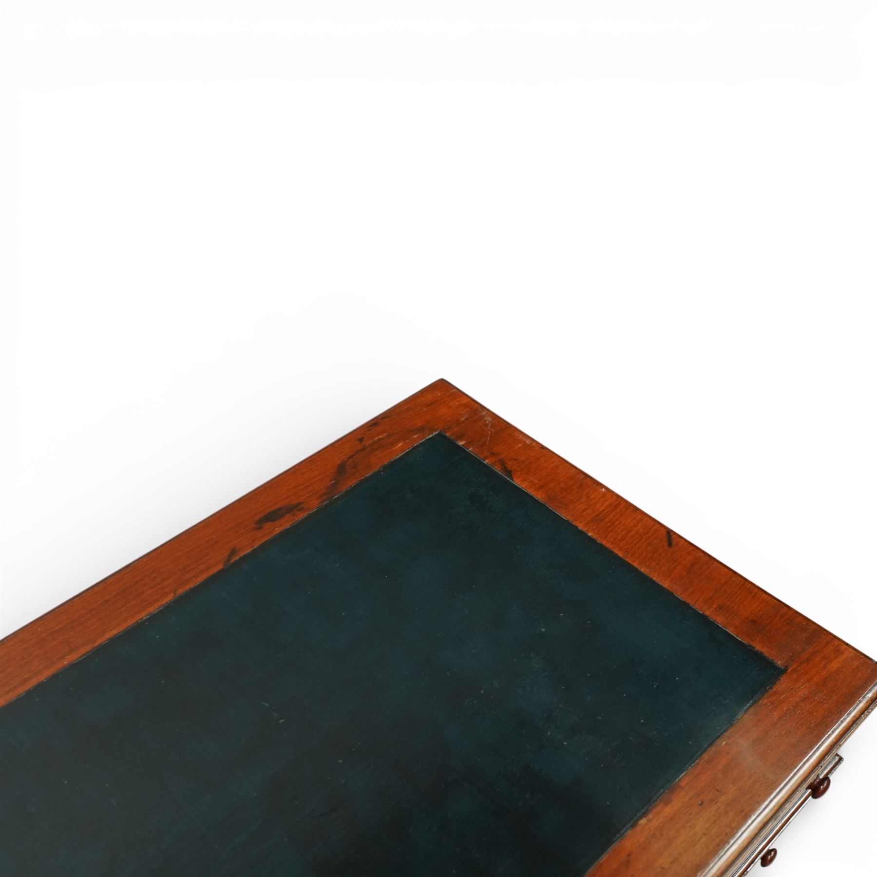 Victorian mahogany pedestal desk, rectangular moulded top inset with green leather writing surface with gilt tooling, fitted with three frieze drawers above opposing pedestals each fitted with three drawers, all with turned wooden knob handles, plinth bases