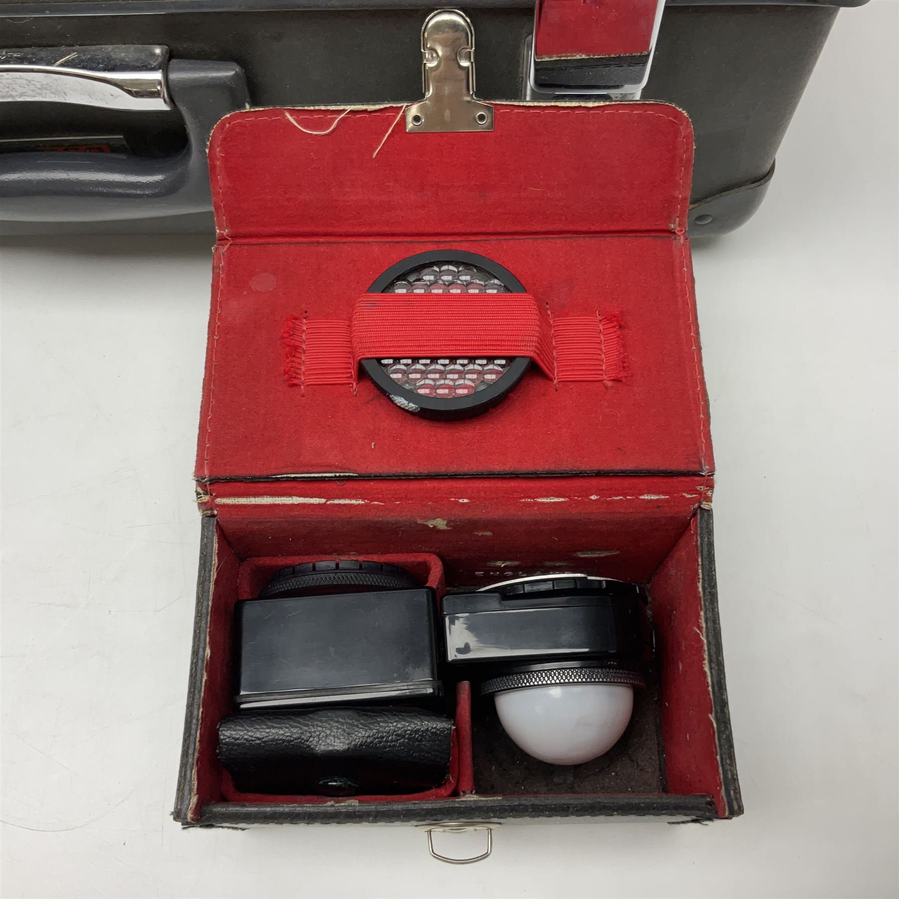 Bolex H16 Reflex camera body, serial no. 136928, with 'Macro-Switar 1:1.9 f=75mm' lens, serial no. 1131474, Switar H16 RX 1:1.6 f=10mm' lens, serial no. 1106324, with hard carry case