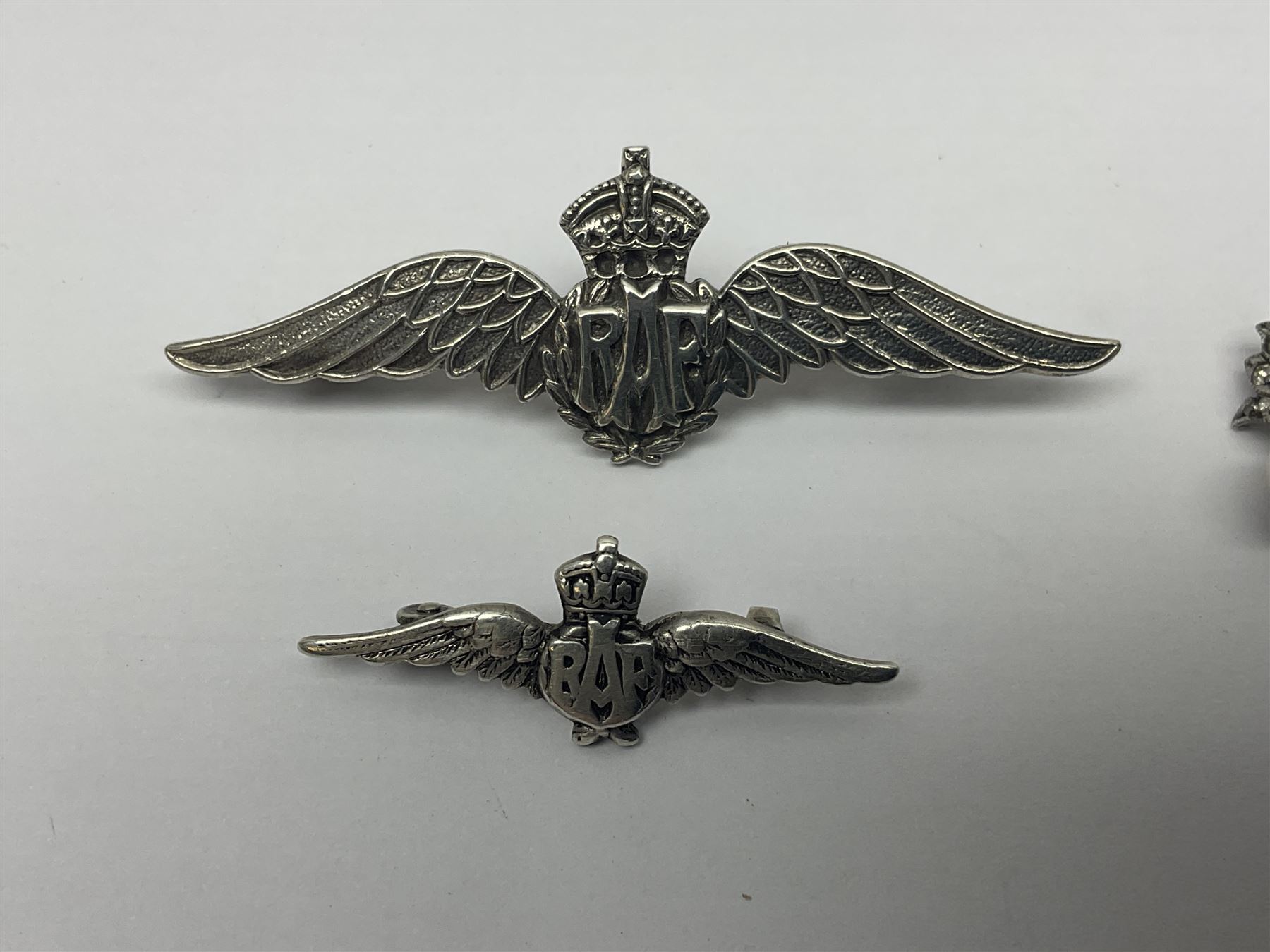 Five sterling silver sweetheart brooches - enamelled Royal Navy, enamelled RAMC, two graduated RAF and cultured pearl and paste flaming grenade stick-pin (5)
