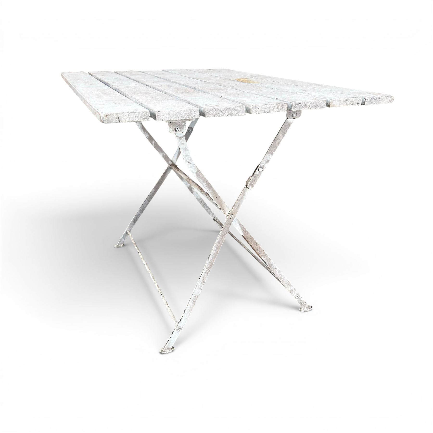 Wrought metal folding garden table, with painted wood plank top; and four matching folding chairs