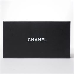 Chanel - pair of oversized sunglasses, with translucent tortoiseshell-effect brown acetate frames and gradient tinted lenses, the arms boldly set with gold-tone ‘CHANEL’ lettering, with original quilted leather case, booklet and box