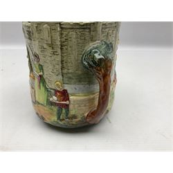 Royal Doulton Wandering Minstrel loving cup modelled by Charles Noke, decorated with figures with a castle in the background, mark to base 'A Wandering Minstrel A Merry Man Moping Mum' limited edition 7/600, H14cm