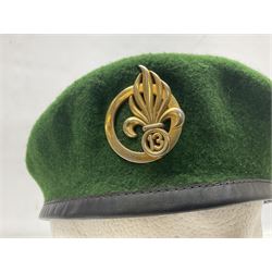 Four paratrooper berets - Russian, Italian, British and Foreign Legion; all with badges (4)