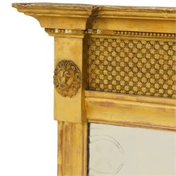 Regency style giltwood and composition tripartite overmantel mirror, rectangular frame with stepped cornice above a pierced geometric frieze, central mirror plate flanked by narrow etched floral side plates, with applied rosette paterae and moulded borders