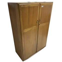Ercol - light elm double wardrobe, enclosed by two panelled doors, fitted with hanging rail