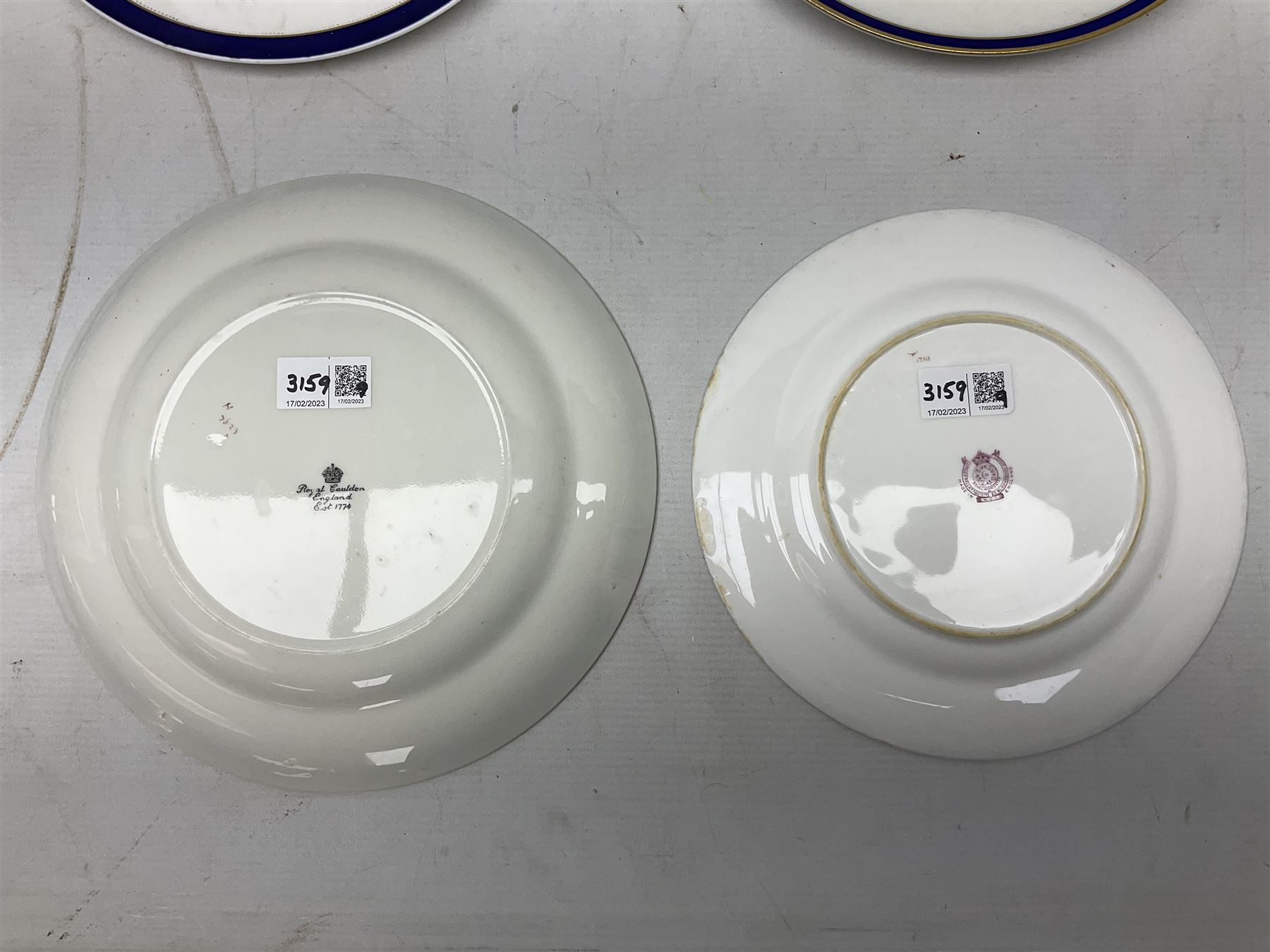 Collection of Regimental dinner wares, Comprising Royal Sussex; two dinner plates, two side plates and a soup bowl, Royal Leicestershire; two dinner plates, East Yorkshire Regiment side plate and Gordon Highlanders side plate, all decorated with the regiment's crests and blue and gilt boarders (9)