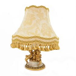 Onyx table lamp, of urn form with scrolling gilt handles, the stepped circular base adorne...