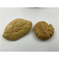Eight carved netsukes, to include dragon, monkey in a nut, frog, rats etc