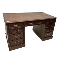 Edwardian mahogany twin pedestal desk, fitted with nine drawers, inset leather top