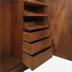 Edwardian walnut double wardrobe, fitted with two panelled doors, opening to reveal fitted interior with hanging space, three sliding linen trays and three drawers