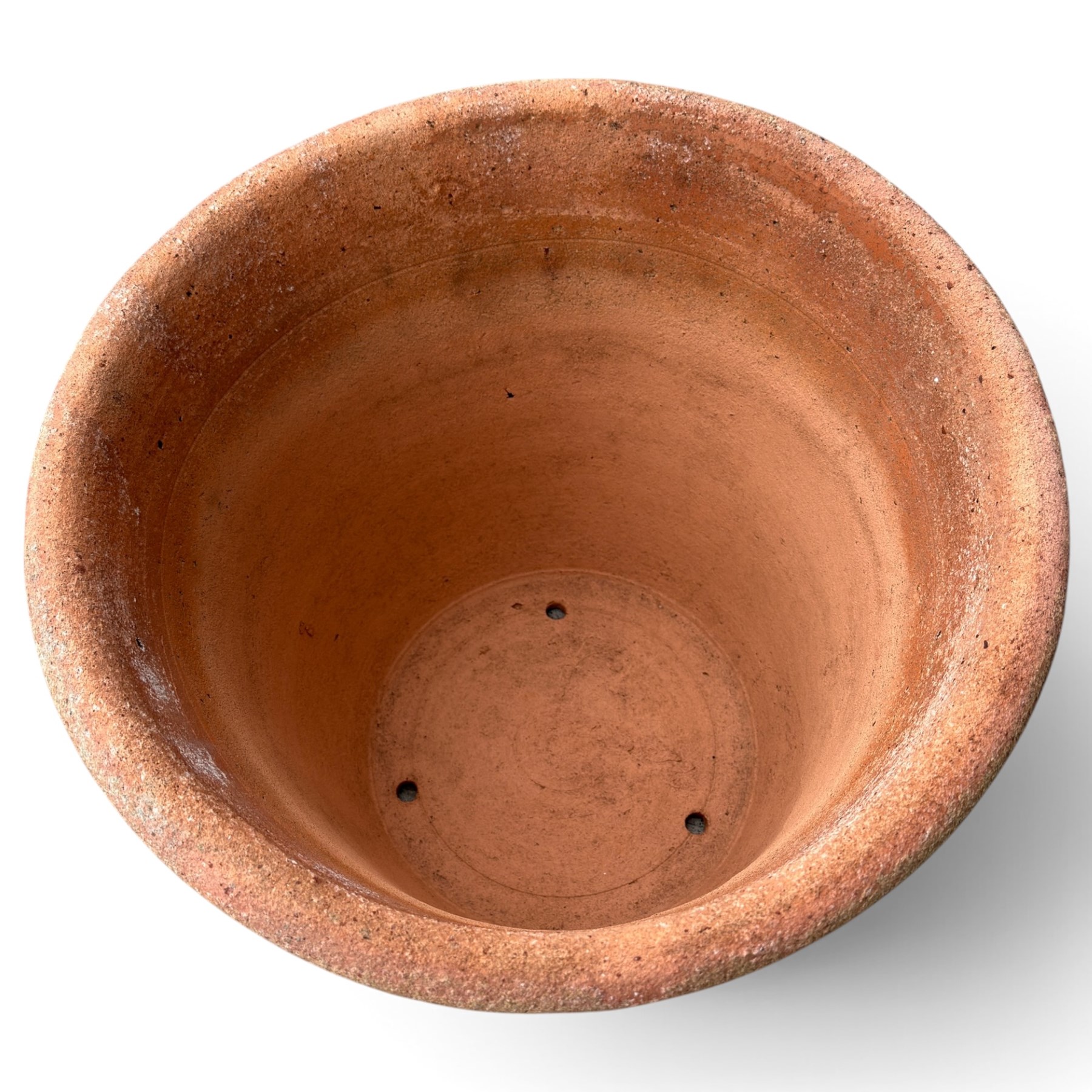Terracotta pot of generous proportions with rolled rim and lattice design in relief