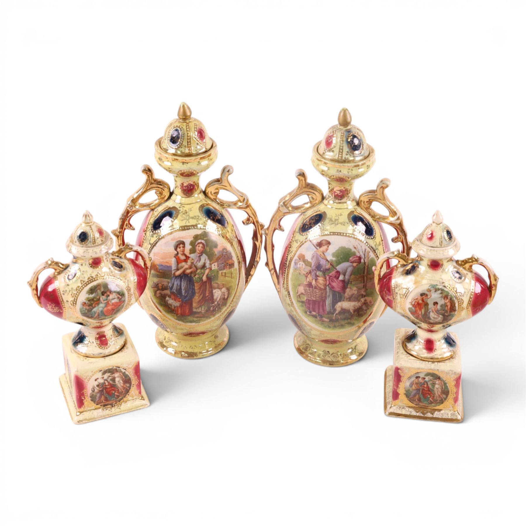 Pair of Royal Vienna twin handle vases with covers the central panel with shepherdesses together with another pair 