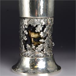 Modern limited edition silver goblet, 'by order of The New Forest of Ninth Centenary Trust this goblet has been produced to mark the 900th anniversary of the Forest in 1979' designed by Hector Miller for Aurum, the fluted planished bowl with gilt interior, upon a stem decorated in relief with oak leaves and acorns revealing a harse and foal to centre, limited edition no. 375, hallmarked Hector Miller, London 1980, H16.5cm, boxed