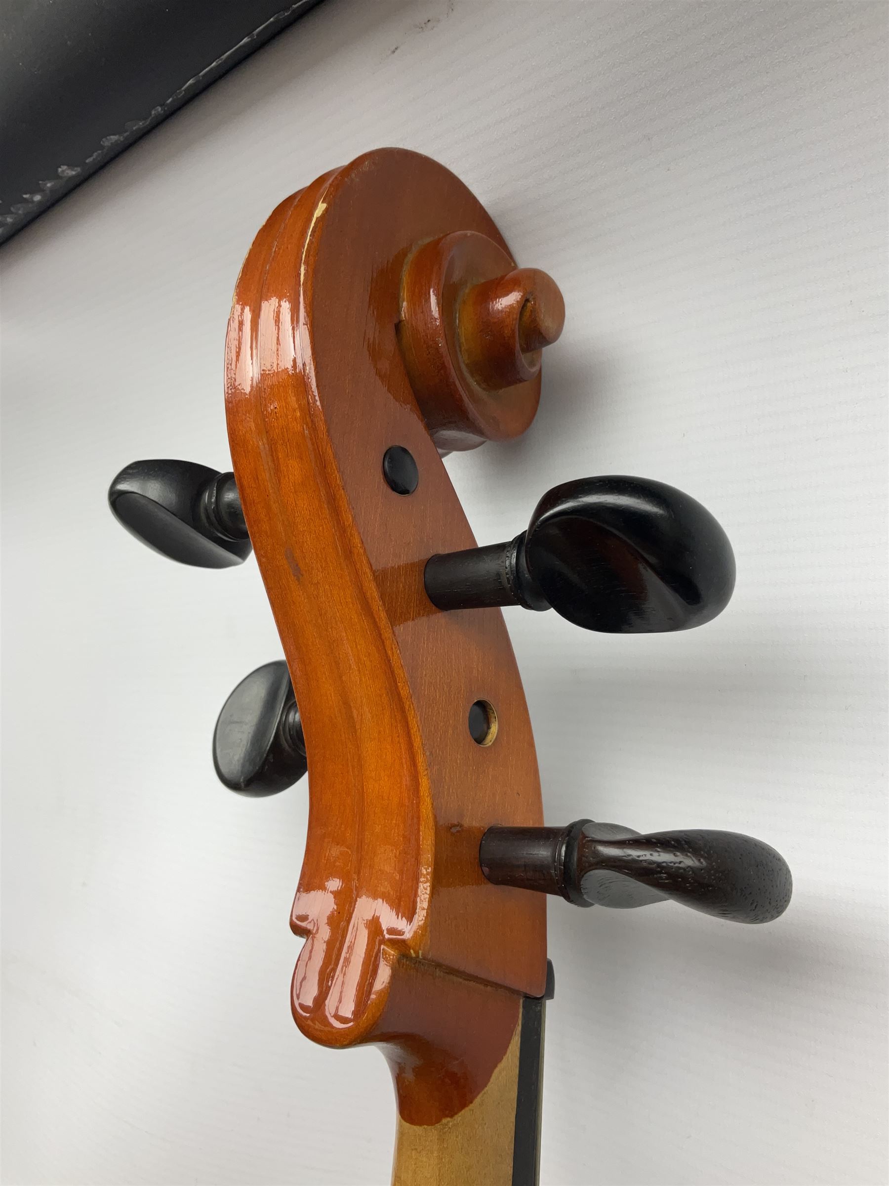 Modern Hungarian half-size cello with 69cm two-piece maple back and ribs and spruce top L114cm overall; and Stentor half size cello bearing label 'The Stentor Student II'; each in soft carrying case (2)