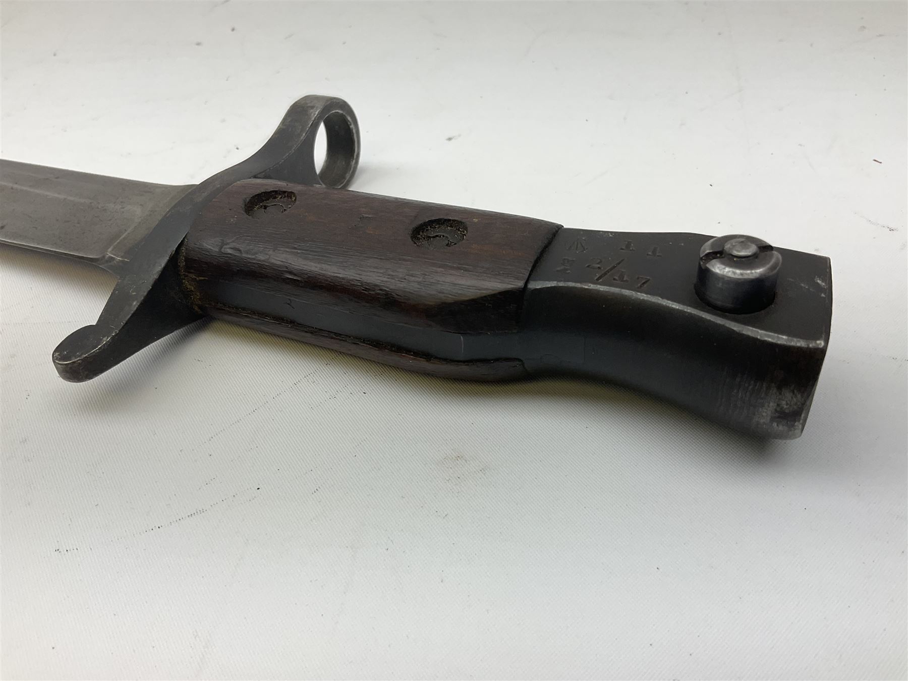 WW1 American Remington P14 rifle bayonet Model 1913, the 43cm fullered steel blade dated 5 17; in metal mounted leather scabbard L57cm overall; and WW1 Canadian Ross Rifle Co.1907 Model Mk.II bayonet, dated 2/17; in leather scabbard with frog (2)