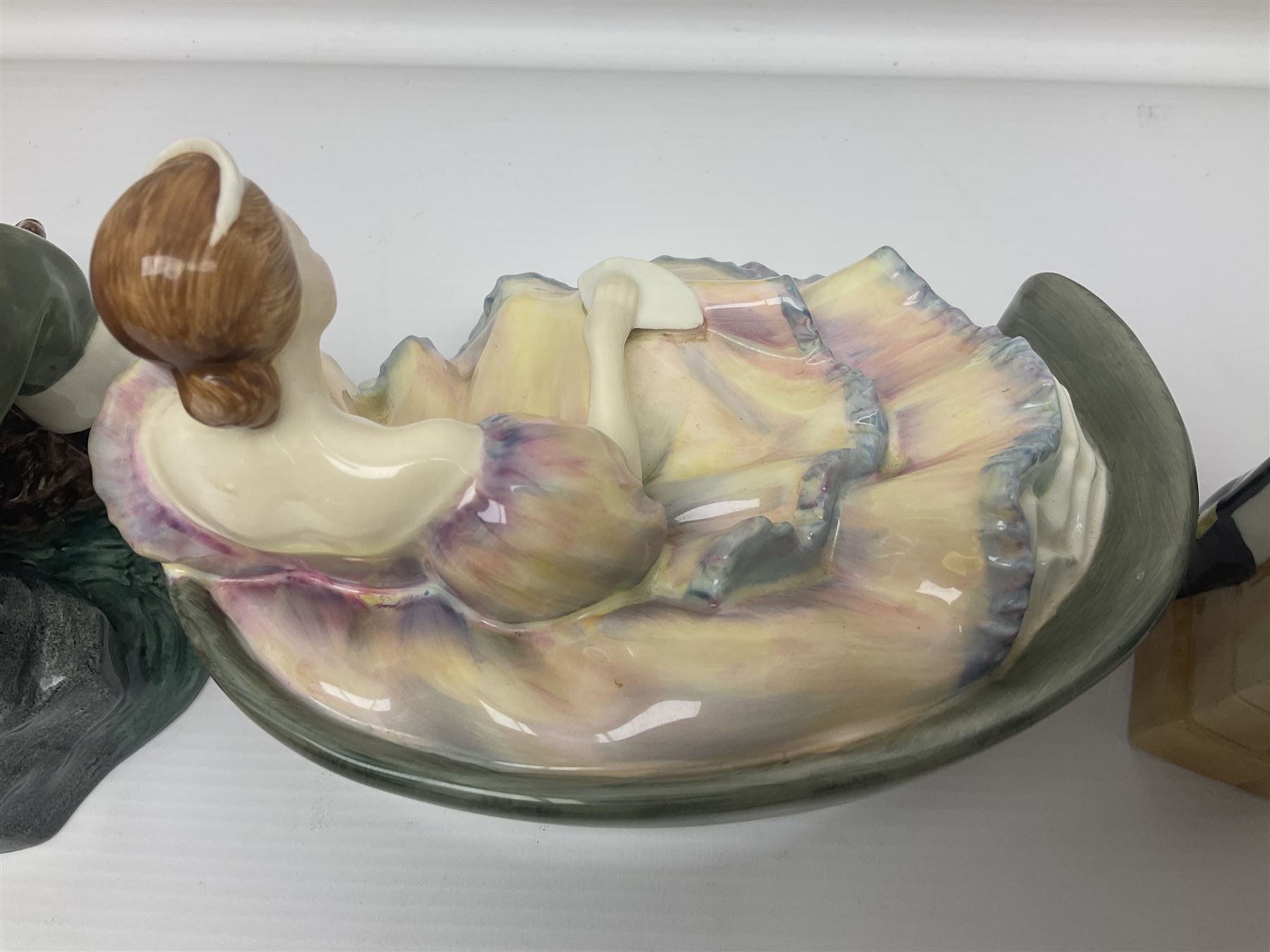 Three Royal Doulton figures, comprising The Lobster Man HN2317, Morning Ma'am HN 2895 and Pauline HN2441