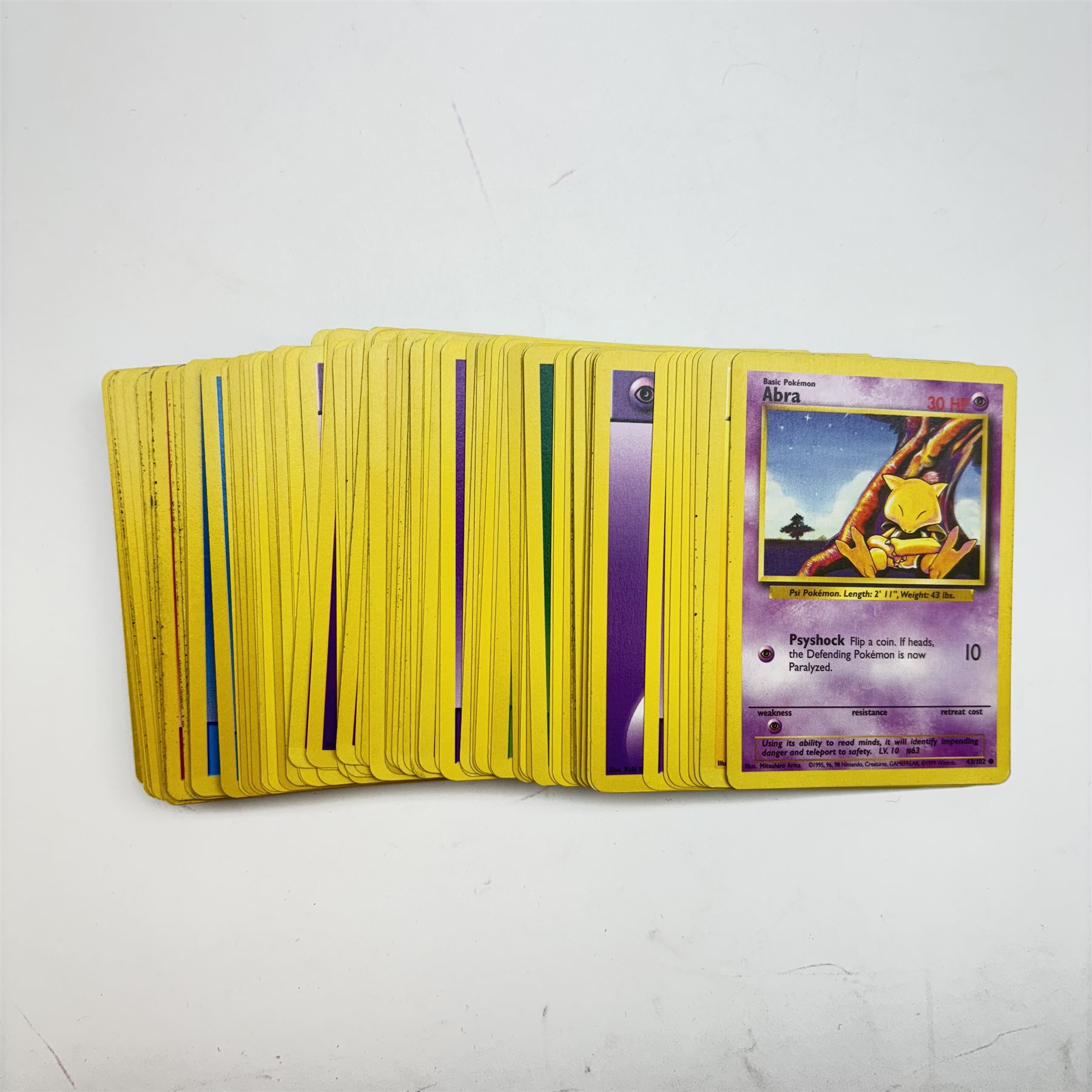 Collection of approximately five hundred vintage Pokemon TCG trading cards, mostly 1999 Wizards examples, including Jungle, Fossil, Team Rocket and Base Set, energy and trainer cards, together with Pokemon collectables including Zapdos 145 Collector Marble Case with eight marbles, Pokemon Gold Version Gameboy game, empty card boxes and Digimon cards