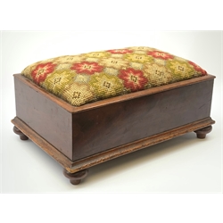 A Victorian mahogany foot stool, of rectangular form with four turned feet and Berlin wool work style padded top, L37cm. 