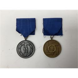 Two WW2 German 'SS' long service awards for four years and eight years, each with blue ribbon (2)