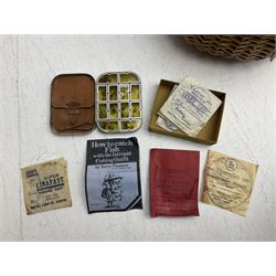 Fishing tackle and accessories housed in two wicker creels, including a landing net, fly tin, small brass reel, other reels to include two Intrepid Boy'o examples, crab lines etc 