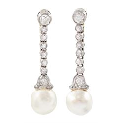 Pair of early 20th century gold pearl and diamond pendant earrings, each stud set with an ...