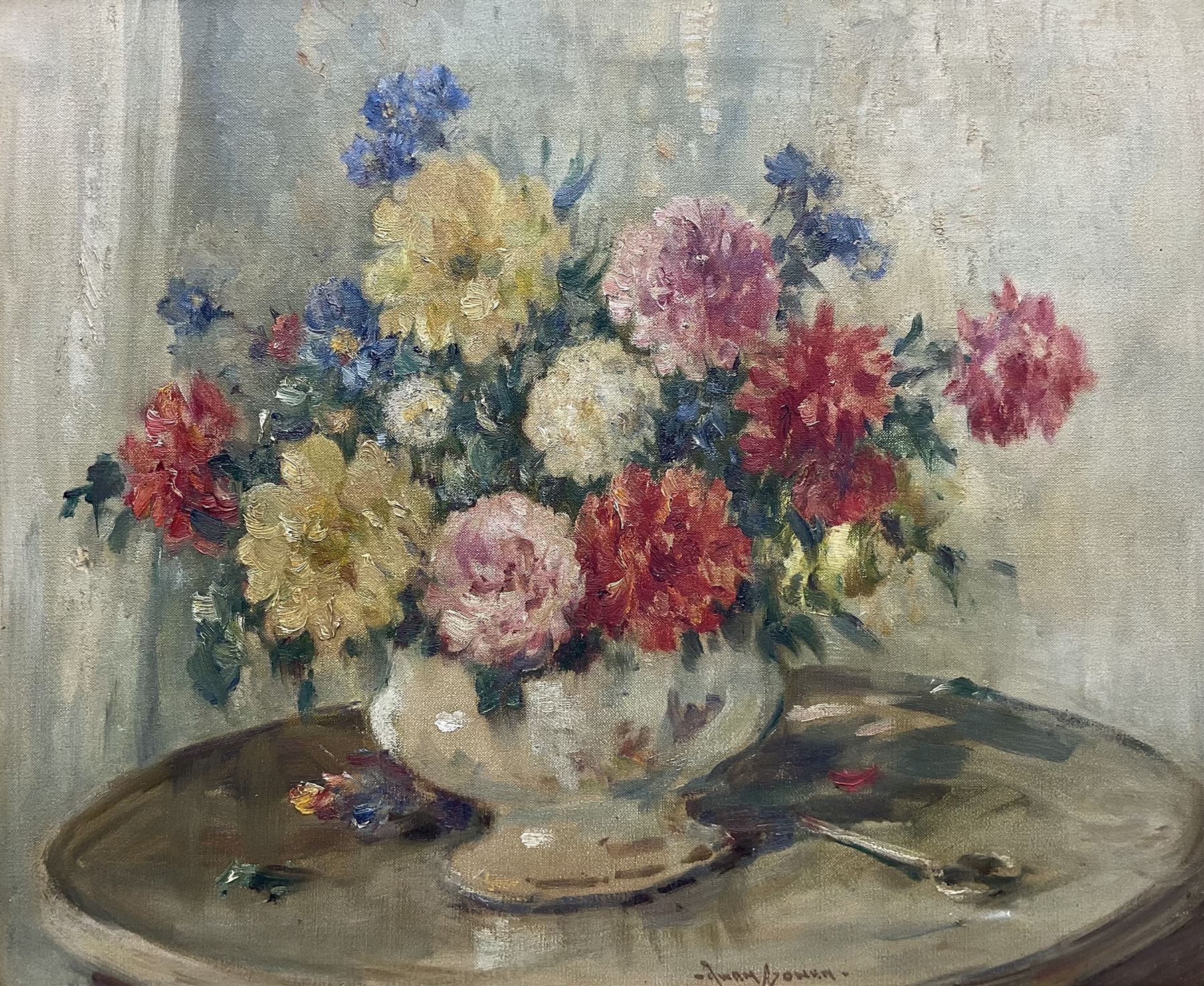 Owen Bowen (Staithes Group 1873-1967): 'Still Life - Flowers in a Bowl on a Table', oil on canvas signed, titled on artist's studio label verso 49cm x 59cm 
Provenance: private collection; acquired from the artist's daughter Betty McDougal (neé Bowen)