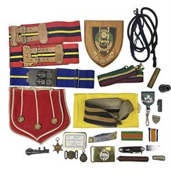 Miscellaneous militaria including two Royal Artillery and one Royal Horse Artillery stable belts; Northamptonshire Regiment trench art brass shell case lighter; unused Matchless Fire-Set; pocket knives and multi-tool; lanyards; oak shield with York & Lancaster crest etc