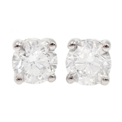  Pair of 18ct white gold diamond stud earrings, stamped 750, diamond total weight 2.43 carat  