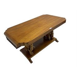 Hardwood coffee table on carved elephant figure supports, platform base on sledge feet