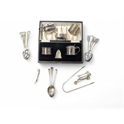 Group of silver, comprising mustard pots, open salts, napkin ring, spoons, sugar tongs and fruit knife, all stamped or hallmarked 