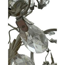 India Jane - silver finish metal chandelier, modelled with scrolling vines and leaves, embellished with faceted glass drops, fitted with six candle sconces, and wired for electricity