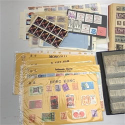 A stockbook album containing 20th century Australian stamps, a Blue Riband album containing world stamps, a group of mainly European 20th century propaganda and advertising stamps, and various stockcards from Hongkong, Indonesia, Malaya, North Vietnam, Mongolia, and Thailand. 