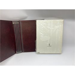 Lladro Collectors Society items, comprising of The Will to Create book, two candle holders; Sailing the Sea no 17665, Dolphins at Play no 17666, Plaque Bringing Us Together, key fob, leather wallet and a members joining pack with plaque, all in original boxes  