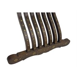 Late 20th century brass inlaid hardwood throne chair, curved X-frame form, raised shaped back inlaid with trailing leafy branches and flower heads, on sledge feet 