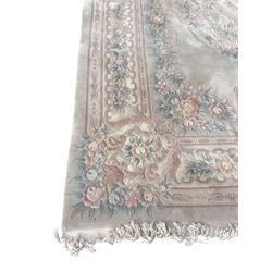 Chinese washed woollen pale ground carpet with overall floral design 