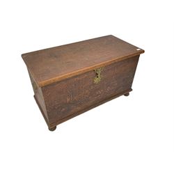 Hong Kong camphor wood chest, rectangular hinged top, carved all over with traditional scenes and dragon boats, on bun feet