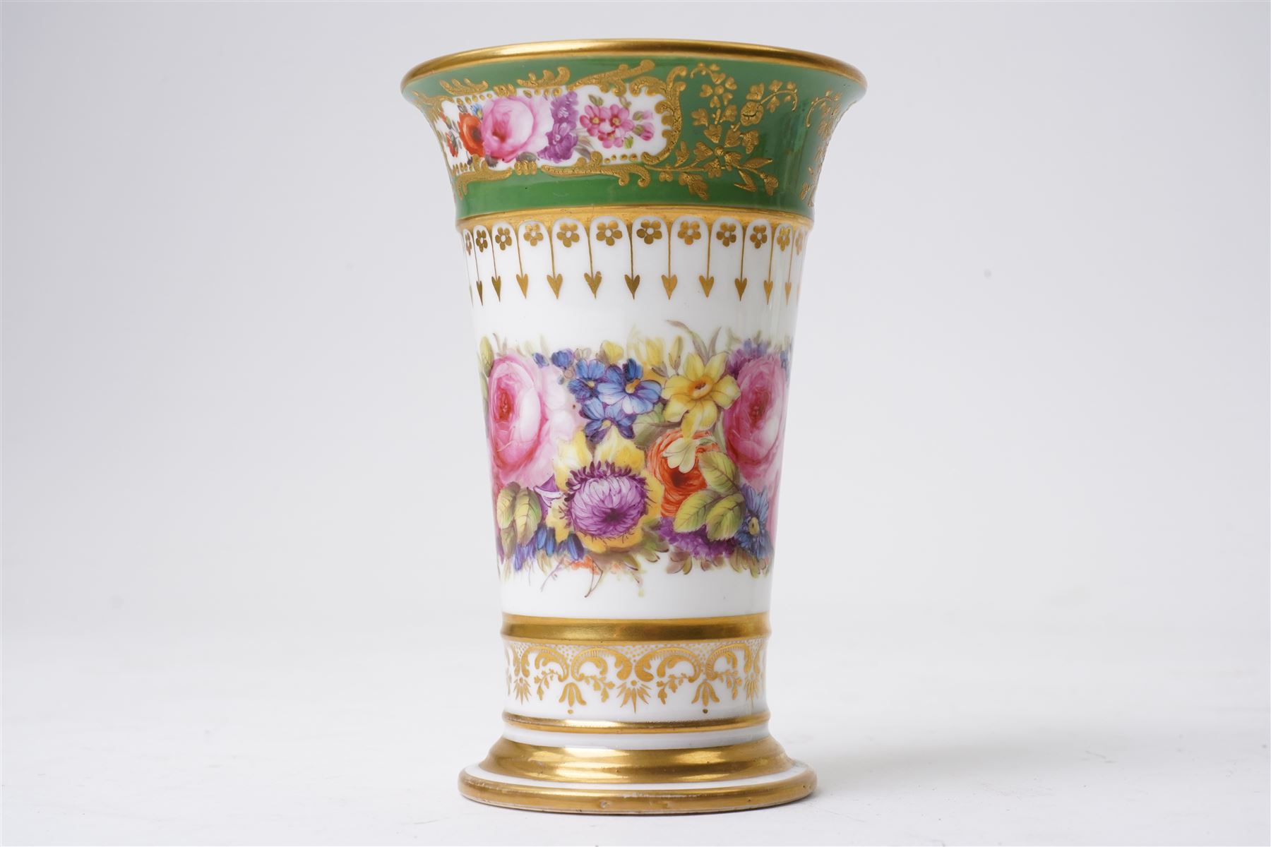 Brown-Westhead, Moore & Co cabinet cup and saucer, with rope twist moulded handle, hand-painted with floral reserves against a white and sky blue ground, heightened profusely with gilt, together with a pink hand-painted example, and a 19th century spill vase and twin-handled covered sucrier (4)