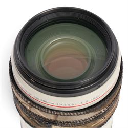 Canon EF 100-400mm f/4.5-5.6L Image Stabilising Ultrasonic camera lens serial no. 4710001538, with camouflage cover and lens case, boxed with instructions
