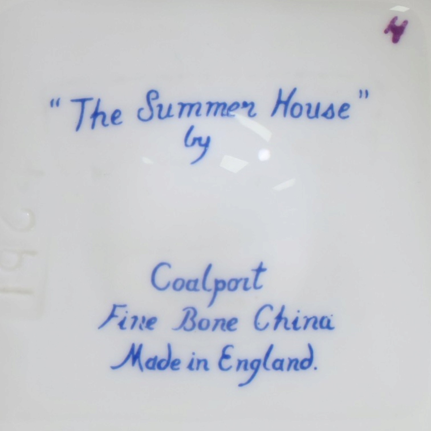 Collection of Coalport items, comprising floral mantel clock, houses including 'Park Lodge' 'The Umbrella House' 'Keepers Cottage', Coalbrookdale floral jar, and others; Kingmaker mouse ornament; Egyptian-style granite Bastet cat ornament, in one box